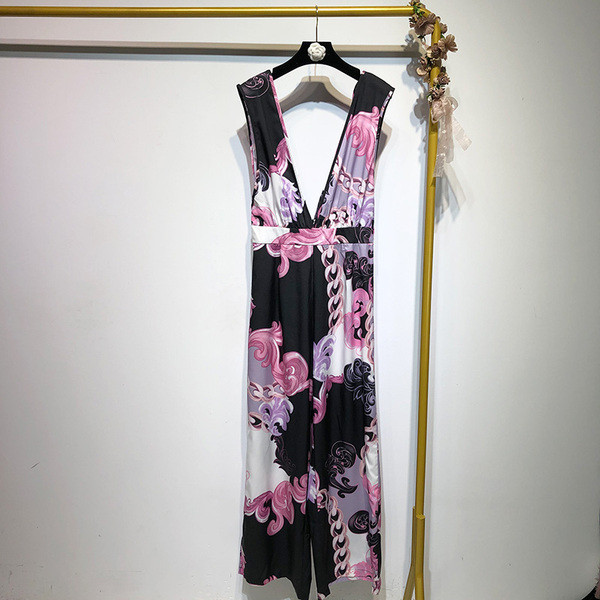 Salopetă de damă cu decolteu în V adânc și spate gol