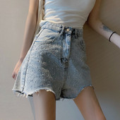 Blugi de damă actuali cu talie înaltă - un model larg