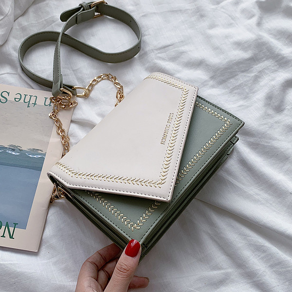 Geanta de dama din piele cu inchidere metalica in mai multe culori