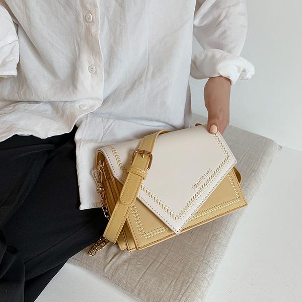 Geanta de dama din piele cu inchidere metalica in mai multe culori