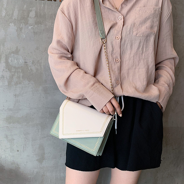 Geanta de dama din piele cu inchidere metalica in mai multe culori