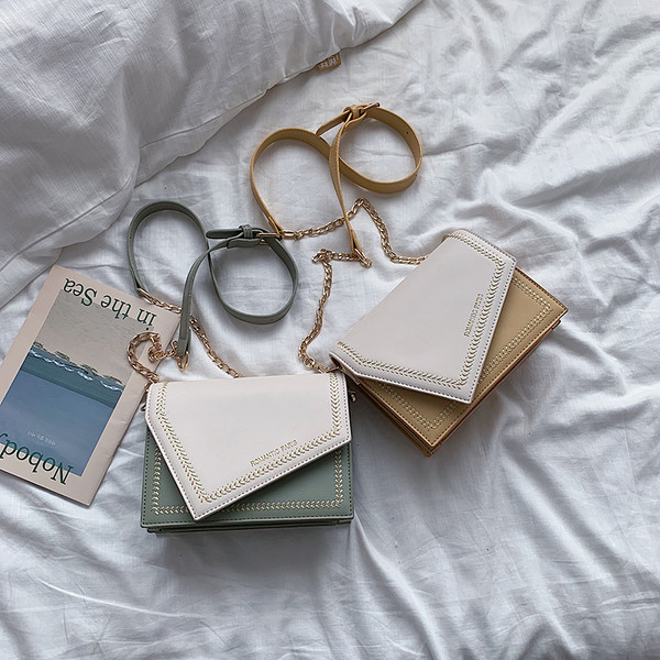 Geanta de dama din piele cu inchidere metalica in mai multe culori