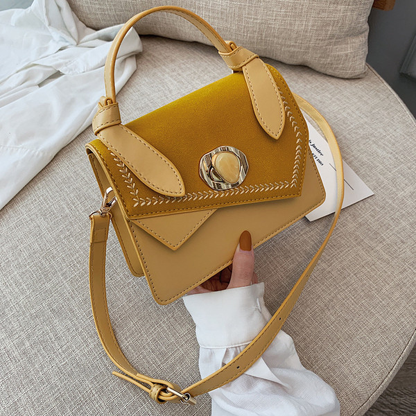 Geanta de dama cu inchidere metalica in mai multe culori