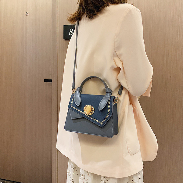 Geanta de dama cu inchidere metalica in mai multe culori