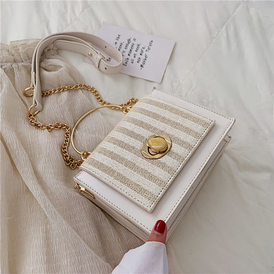 Geanta de dama cu inchidere metalica in patru culori