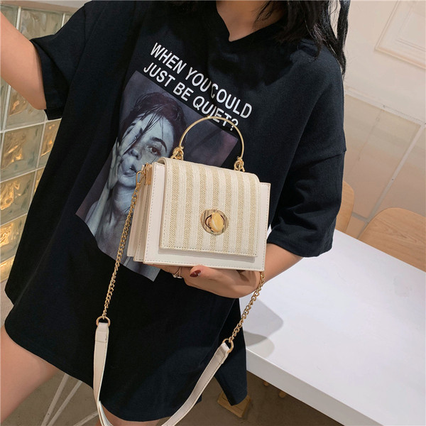 Geanta de dama cu inchidere metalica in patru culori