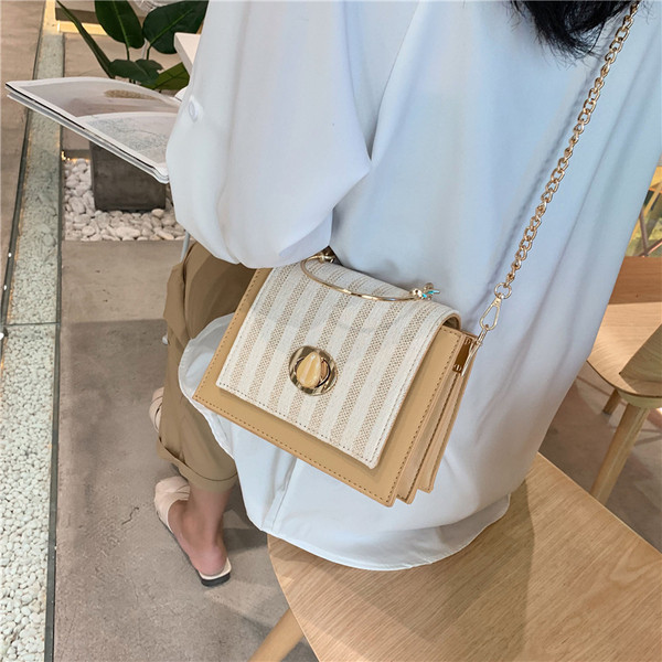 Geanta de dama cu inchidere metalica in patru culori