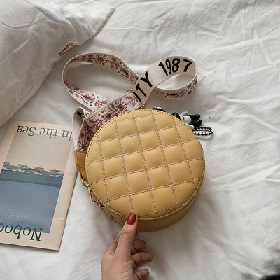 Geanta rotunda de dama cu maner lung