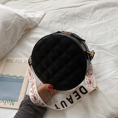 Geanta rotunda de dama cu maner lung