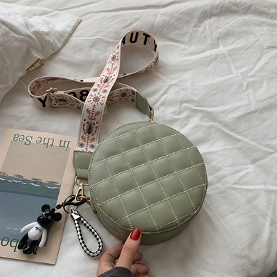 Geanta rotunda de dama cu maner lung