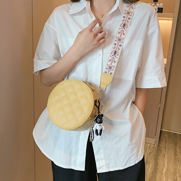 Geanta rotunda de dama cu maner lung