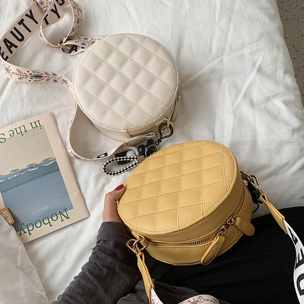 Geanta rotunda de dama cu maner lung