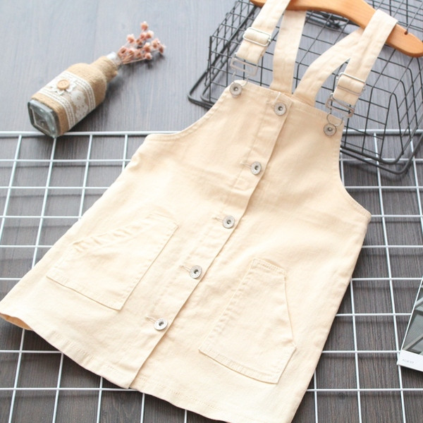 Model nou de rochie pentru copii cu bretele si nasturi in bej si roz