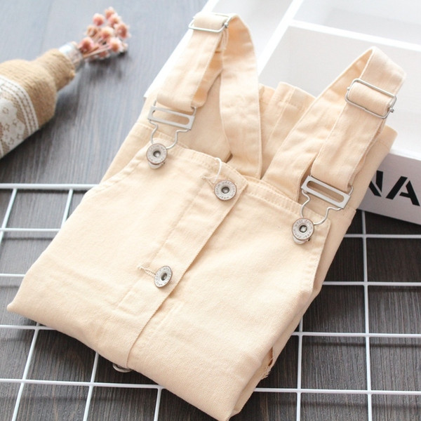 Model nou de rochie pentru copii cu bretele si nasturi in bej si roz