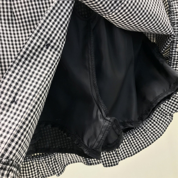 Fusta dama in carouri casual in doua culori cu nasturi