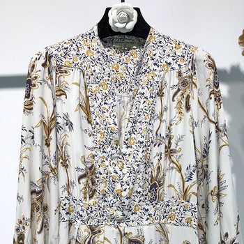 Rochie lungă și largă cu decolteu oval