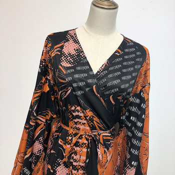 Rochie cu decolteu în V, mâneci lungi și legături în talie cu model colorat