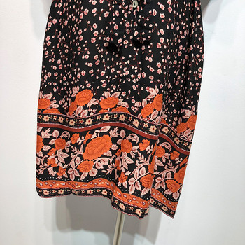 Rochie lejeră cu mâneci scurte și legături în talie