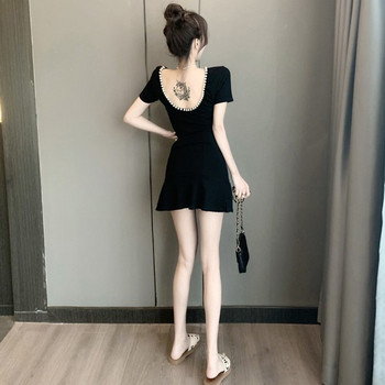 Rochie moderna de dama in alb-negru cu perle decorative