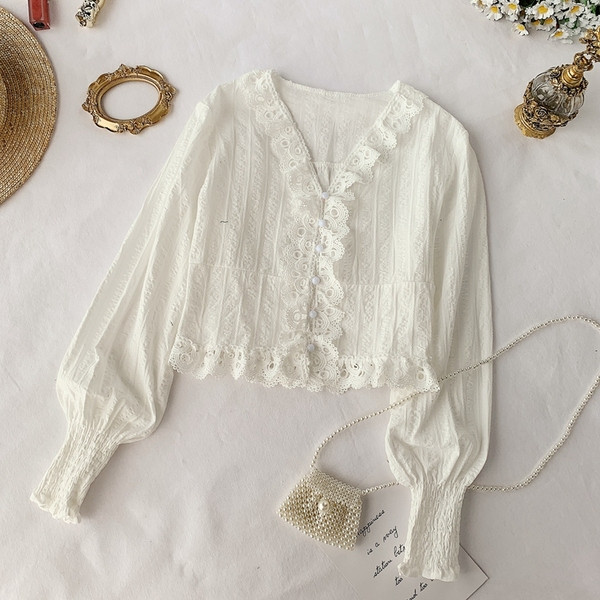 Cămașă elegantă de damă cu decolteu în V în alb-negru