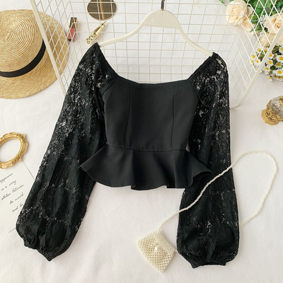 Bluză de damă elegantă cu mâneci din dantelă în alb-negru