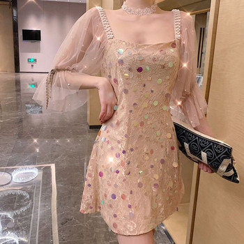 Rochie moderna de dama cu perle decorative de culoare deschisa