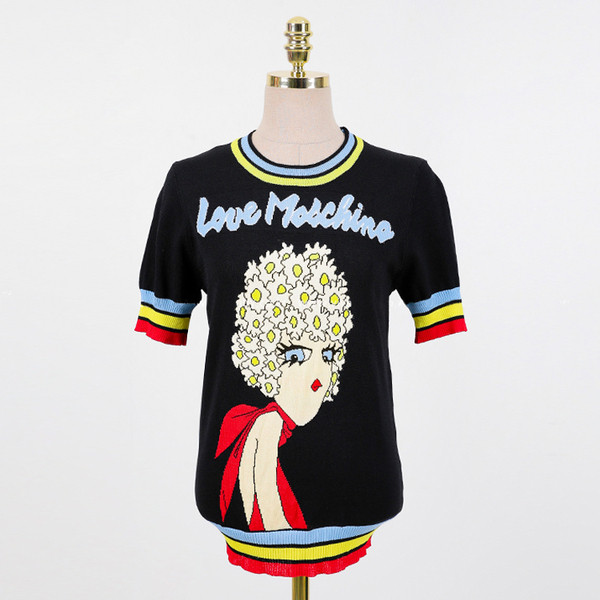 Bluză de damă cu mâneci scurte și broderie colorată cu decolteu O