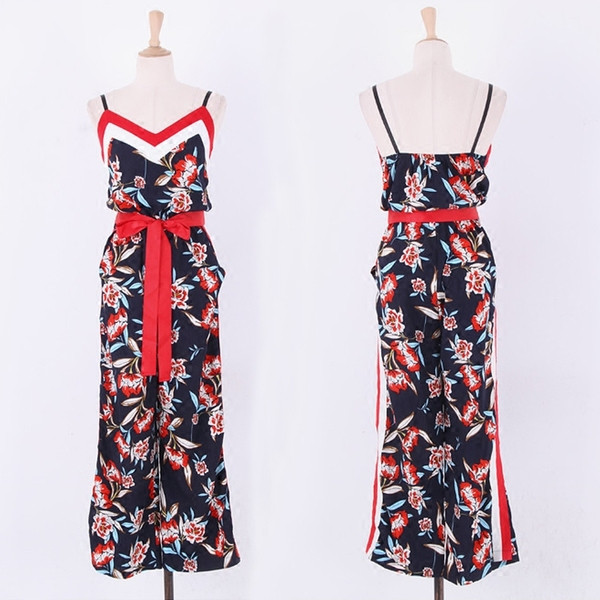 Salopetă de damă elegantă cu model floral și decolteu în V