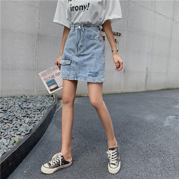 Fusta de dama moderna de culoare deschisa cu buzunare