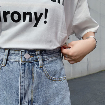 Fusta de dama moderna de culoare deschisa cu buzunare