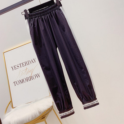 Pantaloni casual dama cu elastic in alb si negru