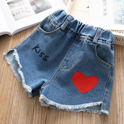 Fashionable denim shorts for girls with applique
