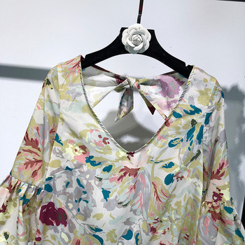 Rochie scurtă cu mâneci lotus și spate gol