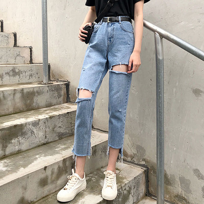 Blugi de dama moderni cu motive rupte si talie inalta in albastru