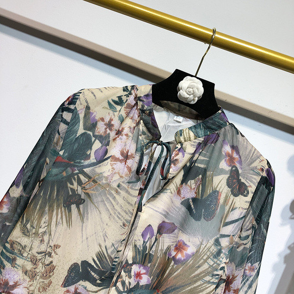 Широка дамска рокля с дълъг ръкав с флорален десен