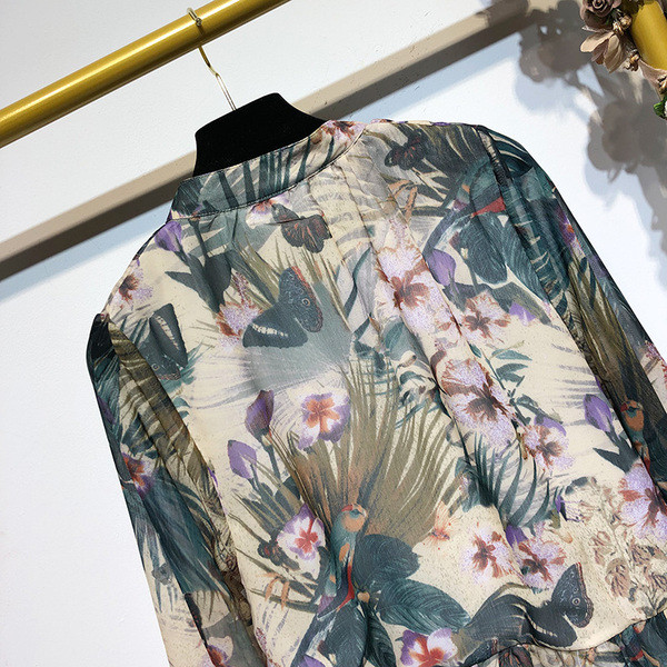 Широка дамска рокля с дълъг ръкав с флорален десен