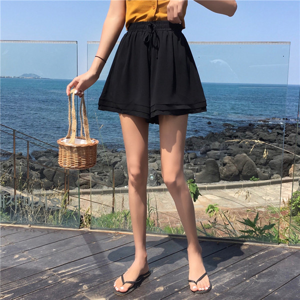 Pantaloni scurti de dama model lat in roz si negru