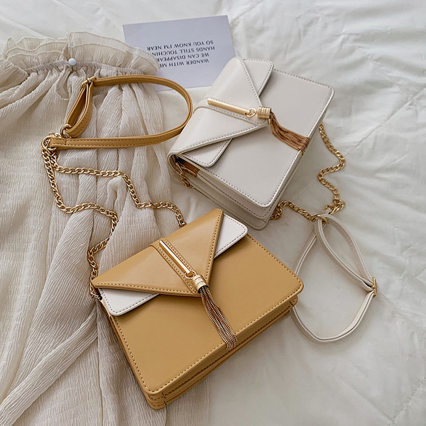 Geanta de dama eleganta cu decor metalic in mai multe culori