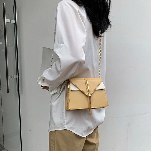 Geanta de dama eleganta cu decor metalic in mai multe culori