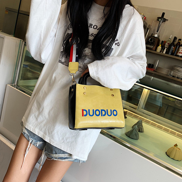 Geanta de dama din piele cu inscriptie in mai multe culori