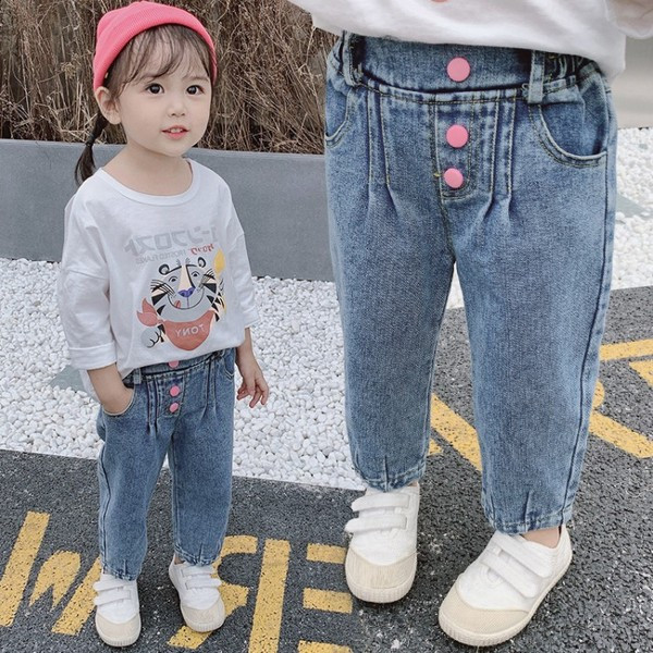 Blugi copii la modă cu nasturi pentru fete