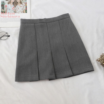 Model fustă de damă croiată în negru, gri și bej