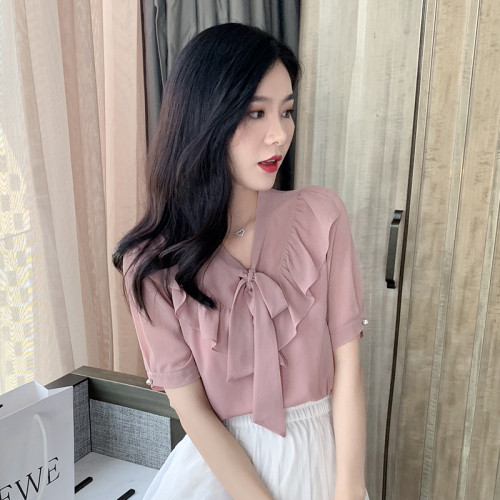 Cămașă de damă de ultimă oră, de culoare roz, cu decolteu în V