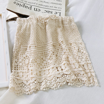 Fusta dama tricotata cu legaturi in talie in alb si bej