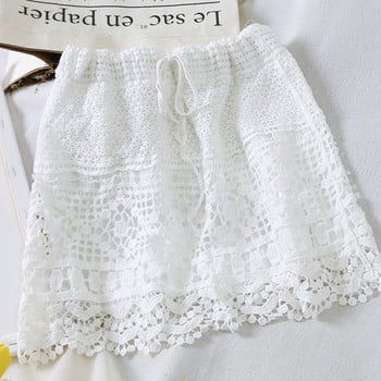 Fusta dama tricotata cu legaturi in talie in alb si bej