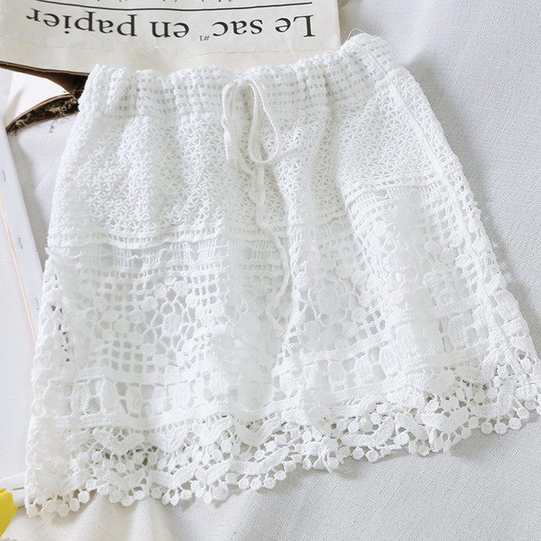 Fusta dama tricotata cu legaturi in talie in alb si bej