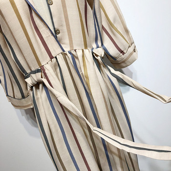 Rochie lungă în dungi, cu legături în talie și mâneci lungi