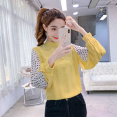 Bluză de damă modernă cu buline în alb și negru