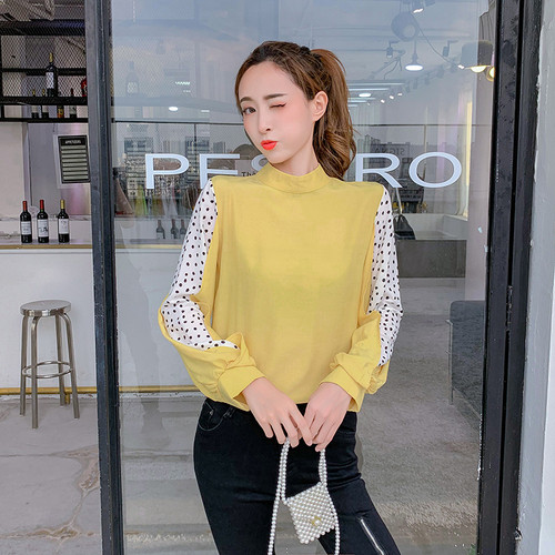 Bluză de damă modernă cu buline în alb și negru