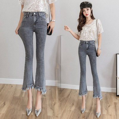 Blugi de dama actuali in gri cu motive rupte cu talie inalta